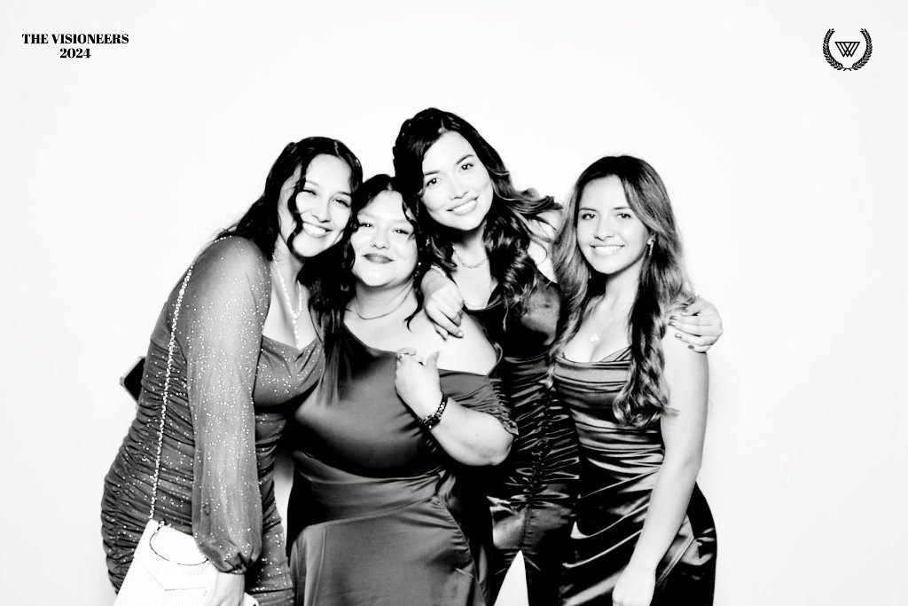 Black and white glam booth print of guests at a gala