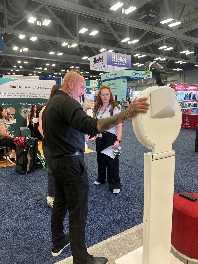 Trade show attendee using the roaming booth on a convention floor